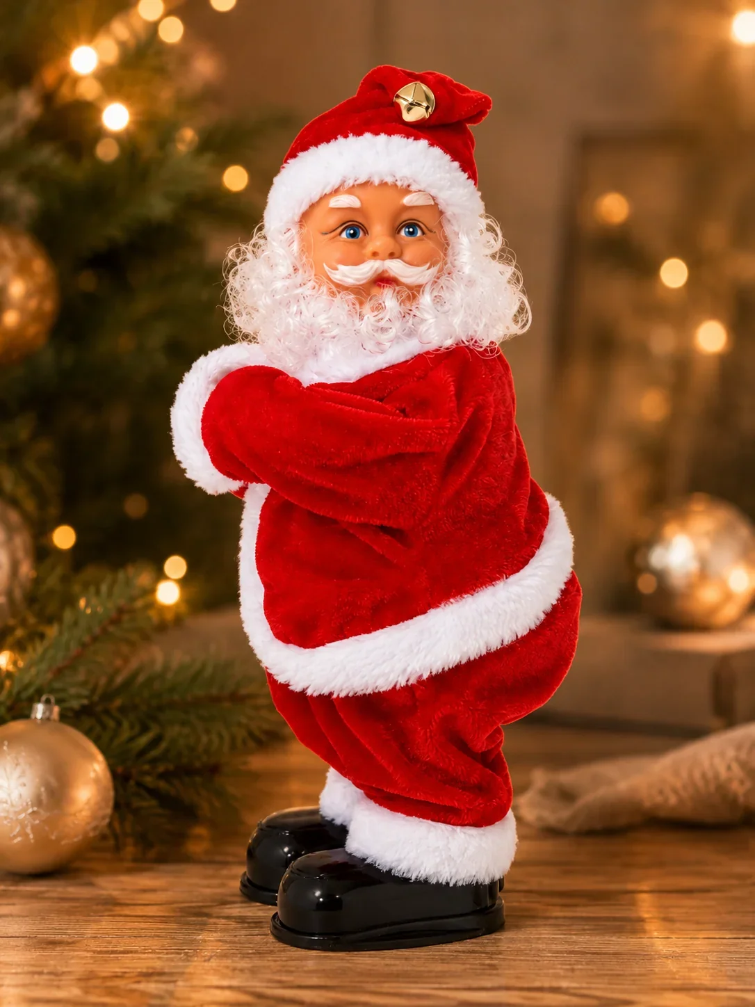 Père Noël dansant avec musique